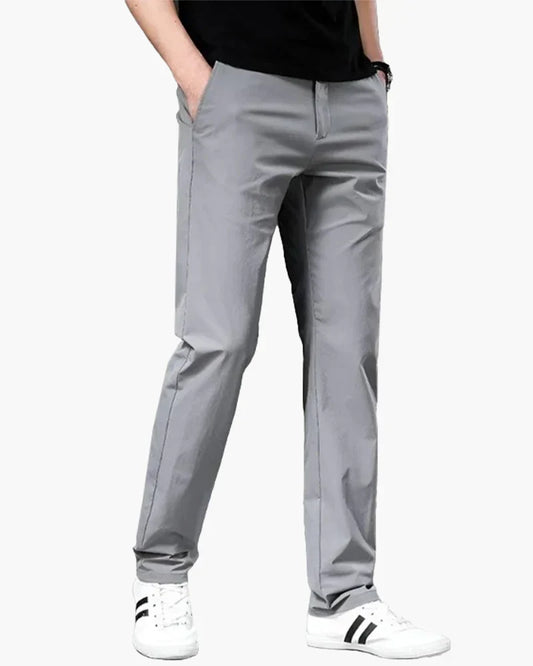 Men's slim-fit flat-front chino trousers - photo 1